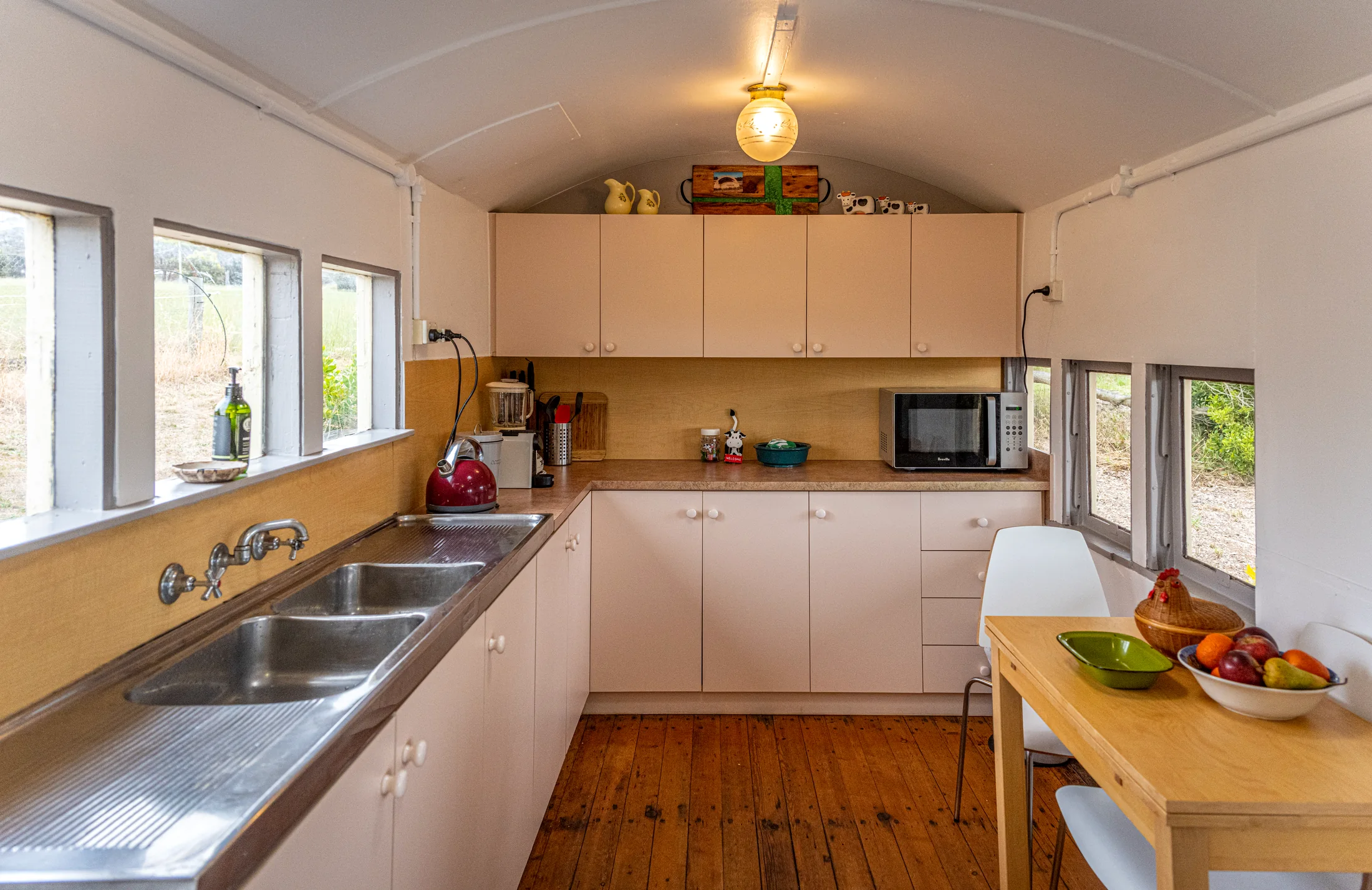 Full kitchen with timber floor