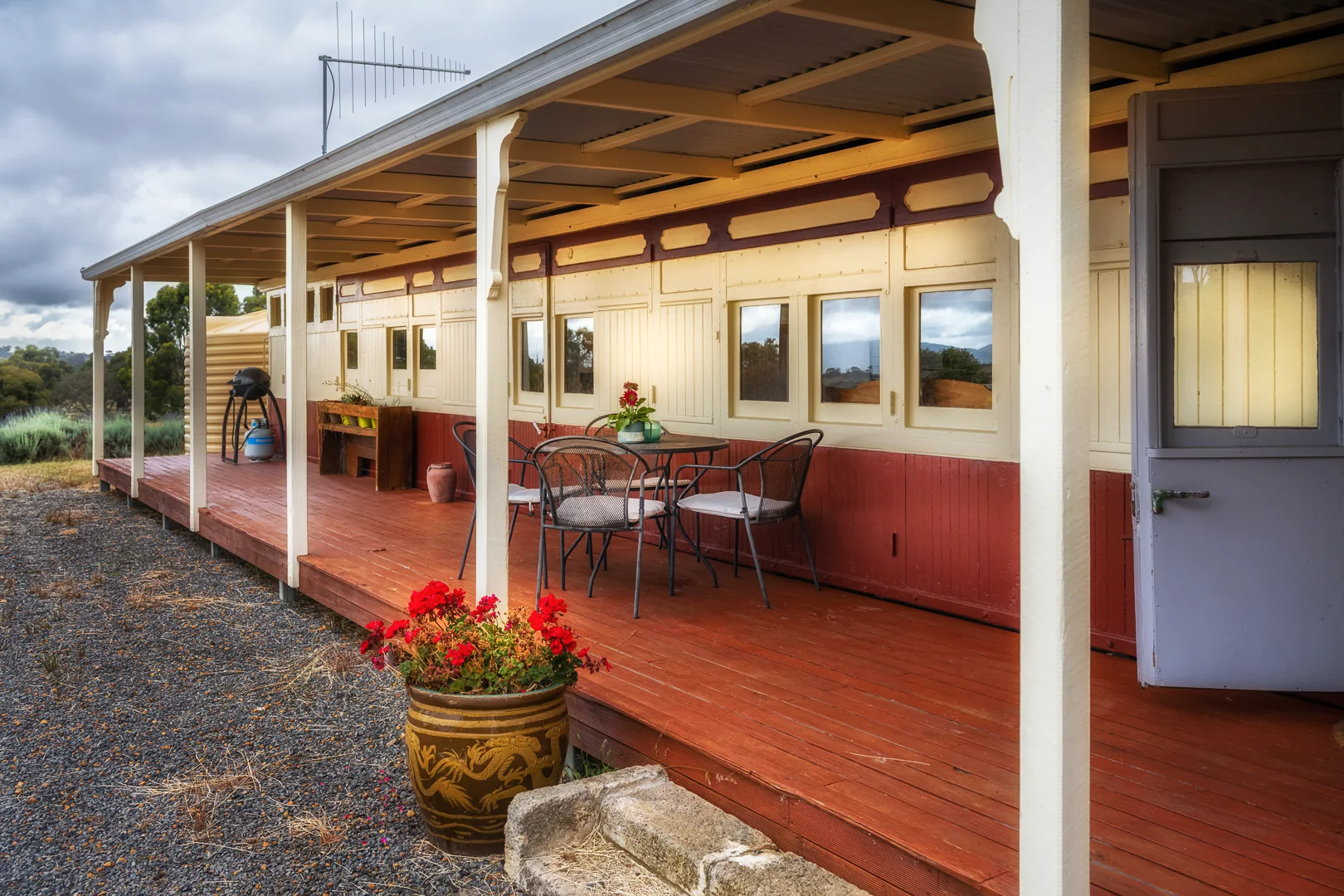 The long verandah of Onegum's restored railway carriage